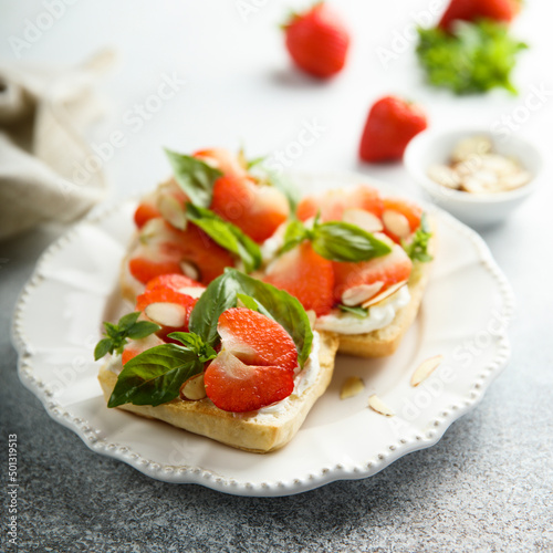 Strawberry crostini with basil and almond 