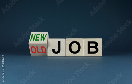 Cubes form the selection words Old job or new job. Concept of work and business