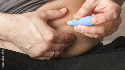 obese fat man preparing Semaglutide Ozempic injection control blood sugar levels