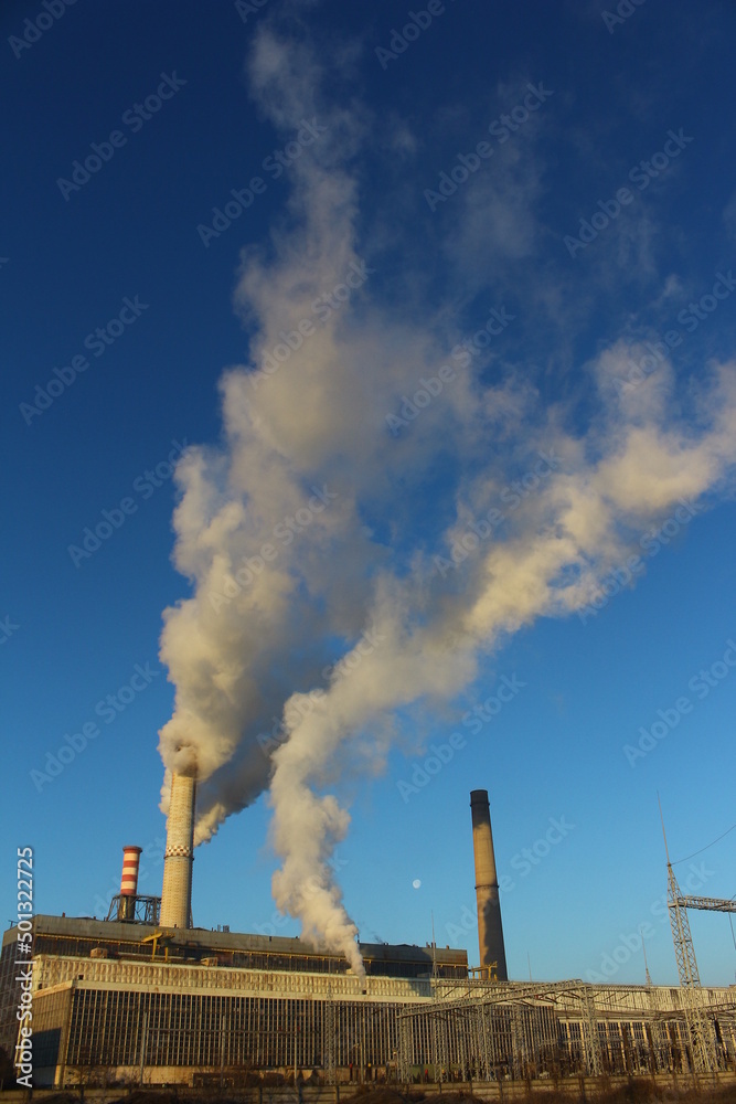Pollution.industry metallurgical plant dawn smoke smog emissions bad ecology.