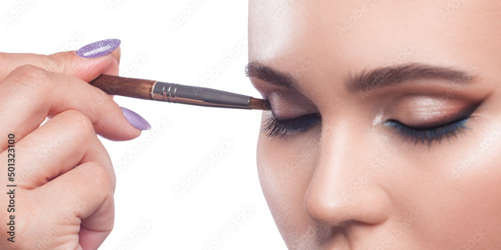 Portrait of a girl with beautiful makeup, extended long eyelashes and healthy clean skin. Makeup and cosmetology concept. Portrait of a girl with beautiful makeup, extended long eyelashes and healthy clean skin. Makeup and cosmetology concept.