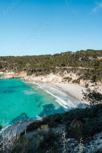 View of Mitjaneta beach with beautiful turquoise sea water, Menorca island, Spain 