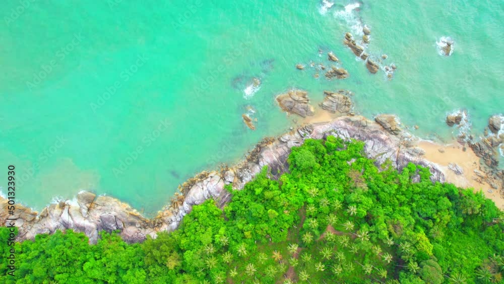 Aerial Top views over beaches, ocean waves crashing on rocks and sand. beautiful tropical sea. Khanom Sichon beaches. Nakhon Si Thammarat, Thailand. 4K drones
Aerial Top views over beaches, ocean waves crashing on rocks and sand. beautiful tropical sea. Khanom Sichon beaches. Nakhon Si Thammarat, Thailand. 4K drones