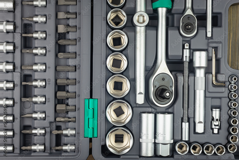 A set of professional wrenches in cradles, sockets, ratchet wrench, torx. A set of ratchet heads, different socket wrenches close-up in a plastic case. Concept Star keys set. Set of tools. Car repair. A set of professional wrenches in cradles, sockets, ratchet wrench, torx. A set of ratchet heads, different socket wrenches close-up in a plastic case. Concept Star keys set. Set of tools. Car repair.