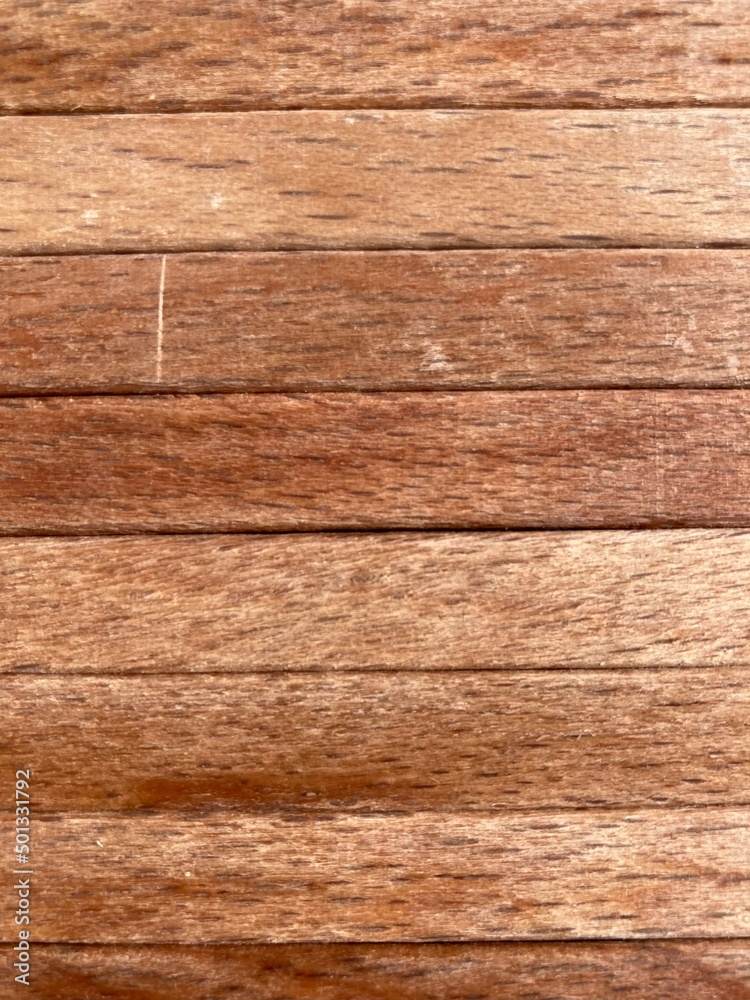 light wood planks strung side by side light wood planks strung side by side