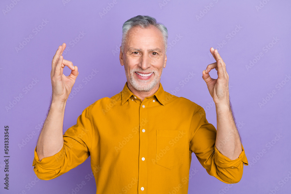 Photo of hooray elder white hairdo man show okey wear mustard shirt isolated on violet color background