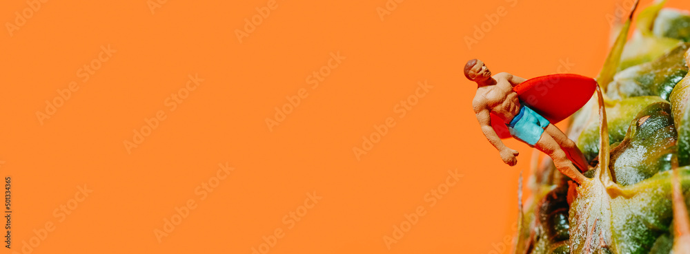 miniature surfer man on a pineapple, banner miniature surfer man on a pineapple, banner