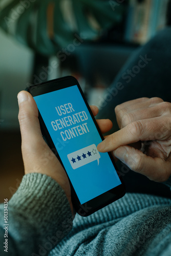 Photography text user generated content in his smartphone
