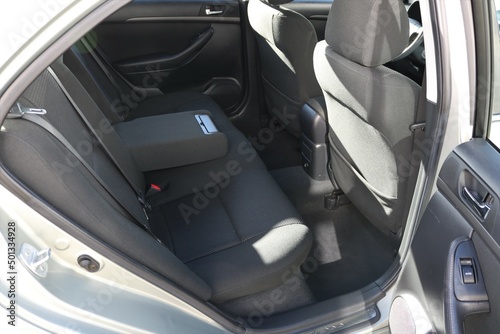 Auto interior with back seats.