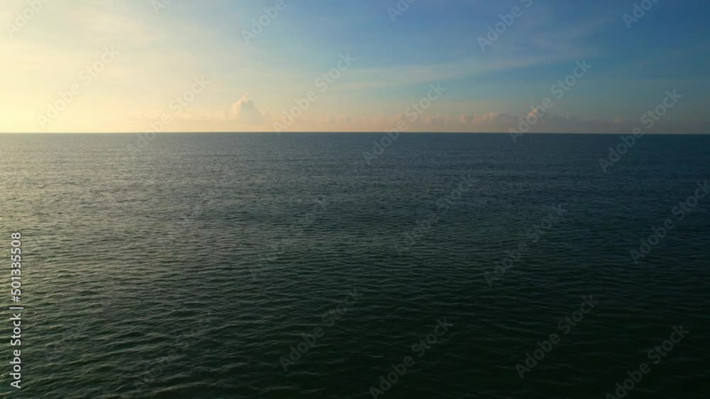 4K drone aerial view of beautiful ocean waves, fly over the sea, small waves in the sea. sea in the tropics. Background footage for summer. cinematic drone shot
4K drone aerial view of beautiful ocean waves, fly over the sea, small waves in the sea. sea in the tropics. Background footage for summer. cinematic drone shot