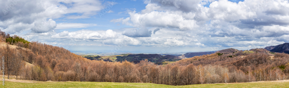 Beautiful panorama of the Serbia hills with many clouds in the sky. Bobija mountain view