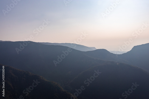 mountain shadow with white mist at morning from flat angle
