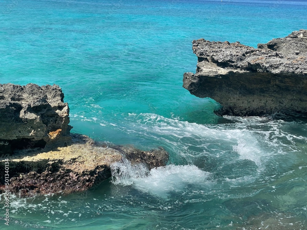 Waves crashing on rocks Grand Cayman Smith Cove Beach