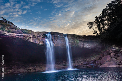 waterfall streams falling from mountain top at morning long exposure shot from different angle