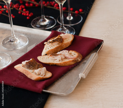Smoked Sturgeon on crostini with champagne