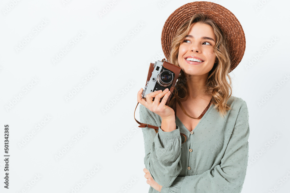 Confident young woman photographer smiling