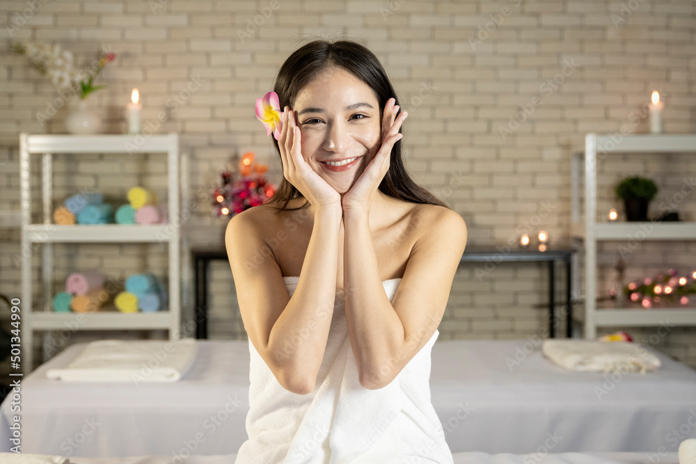 A beautiful and bright Asian teenage girl in Thailand is preparing to have a spa treatment at a spa salon. A beautiful and bright Asian teenage girl in Thailand is preparing to have a spa treatment at a spa salon.
