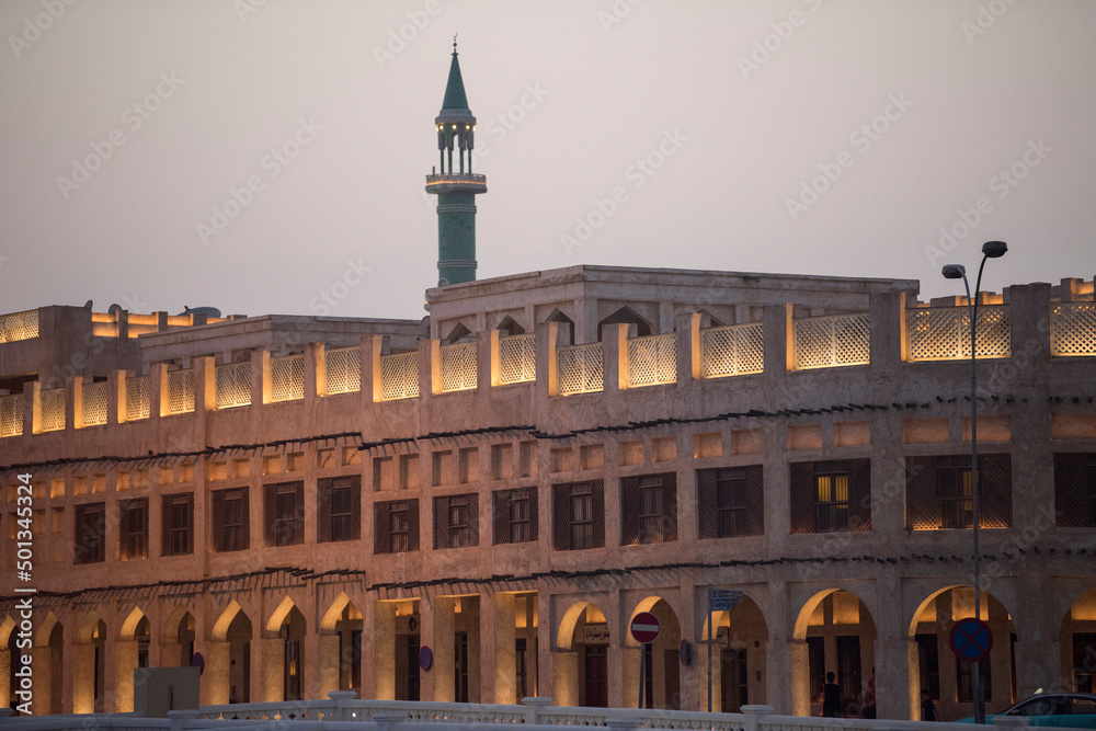Doha, Qatar, April 22,2022: Night views of the traditional Arabic architecture of Souq Waqif Market.