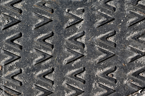 Metallic surface with arrows