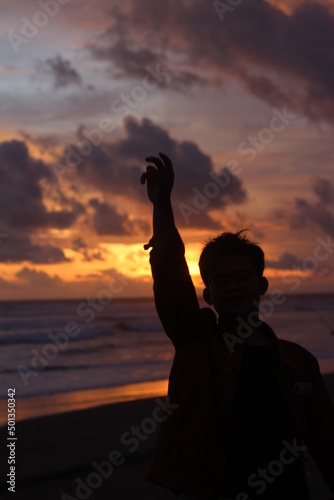 silhouette of a couple on the beach