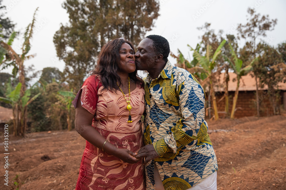 a senior African couple kissing, romantic and passionate moment between partners