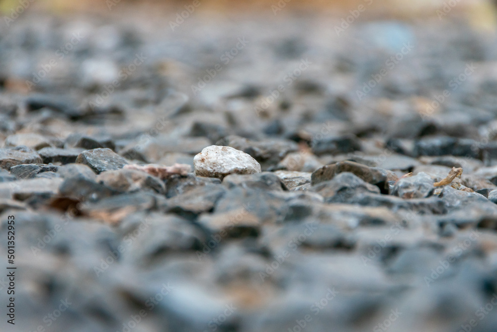 Area paved with stones of many colors, Blur rocks background. Area paved with stones of many colors, Blur rocks background.