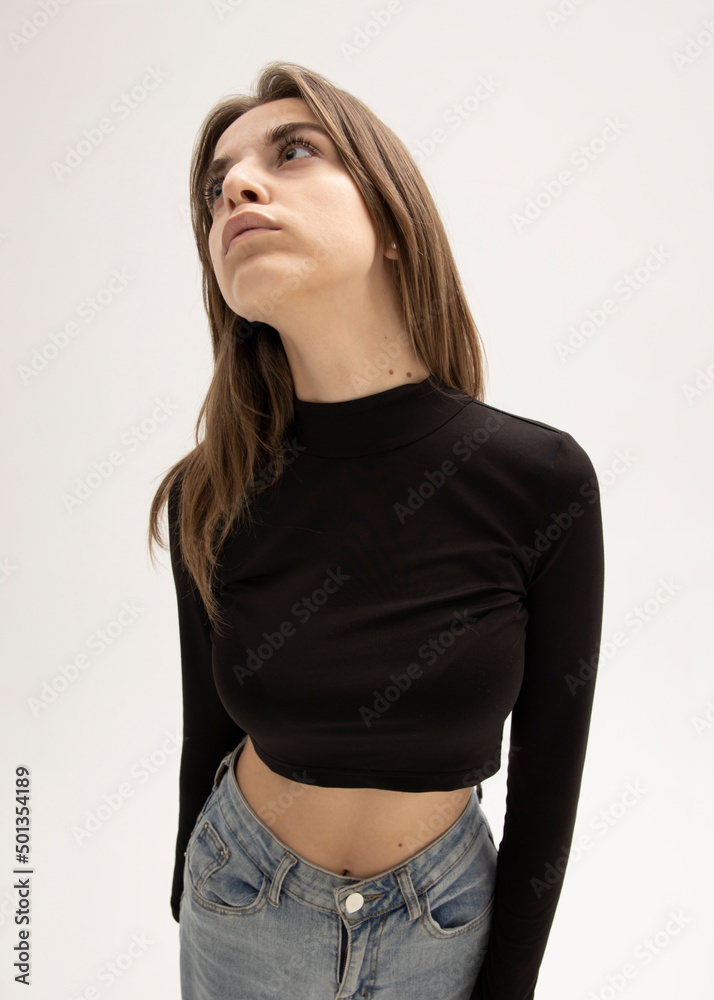 portrait of a pensive woman on a light background portrait of a pensive woman on a light background