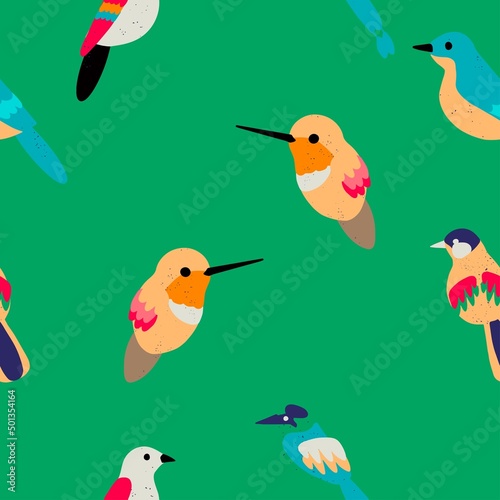 Vector seamless pattern with exotic birds on bright green background. Design for fabric, wallpaper, textile and decor. 