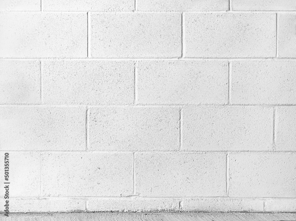 Naklejka premium Grain and rough detail on rectangle white painted brick wall, seamless. Horizontal pattern of structure outside and inside of building. Plastering wall, industry minimal style. Texture background.