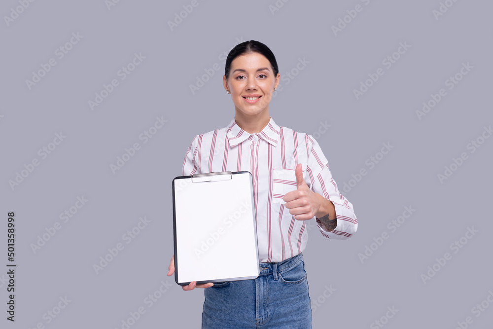 Office Girl Showing Blank Clipboard Showing Thumb Up Isolated. Advertisment, Office, Commercial Concept Office Girl Showing Blank Clipboard Showing Thumb Up Isolated. Advertisment, Office, Commercial Concept