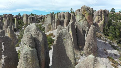 Rock formations of Valle de los Monjes, Chihuahua, rising forward aerial