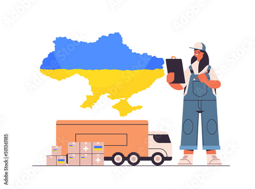 delivery woman giving help boxes with Ukraininan flag to refugees humanitarian aid material assistance governmental help