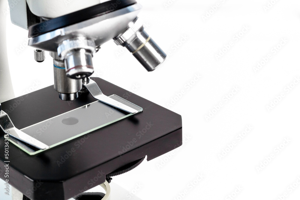 Lens of microscope close up. Research in scientific medical laboratory Lens of microscope close up. Research in scientific medical laboratory