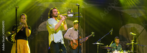 Photography Rock band playing on the concert at night