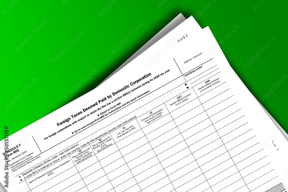 Form 965 (Schedule F) documentation published IRS USA 11.13.2020. American tax document on colored Form 965 (Schedule F) documentation published IRS USA 11.13.2020. American tax document on colored