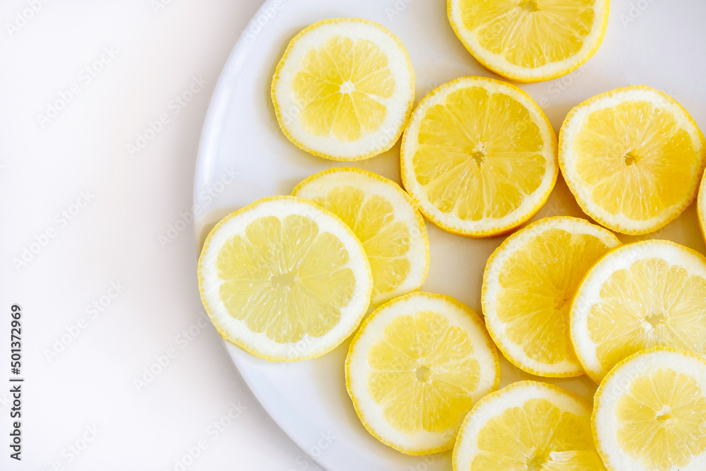 plate with freshly cut lemons