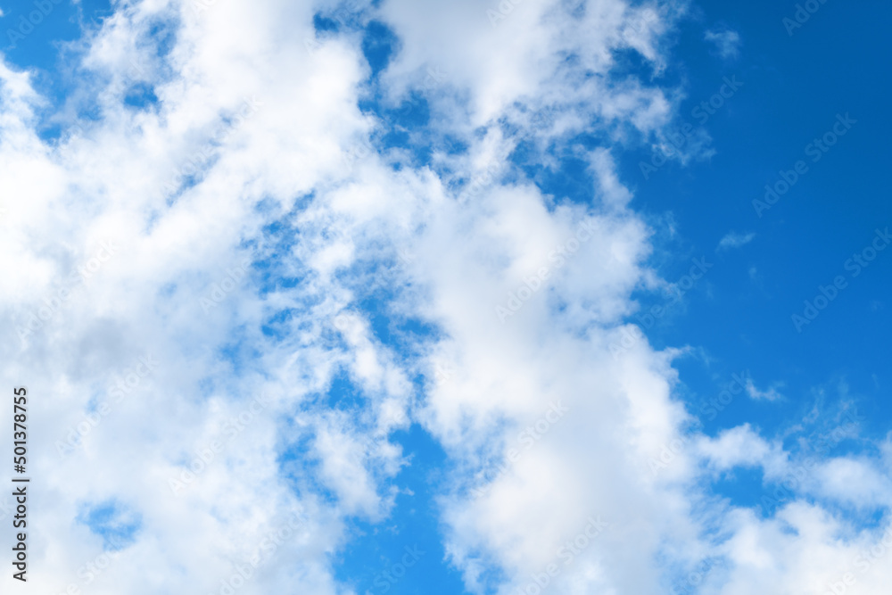 Blue sky with clouds. Sky background. Selective focus Blue sky with clouds. Sky background. Selective focus