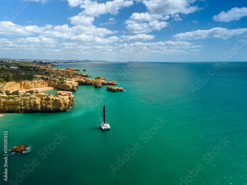 Fototapeta Naklejka Na Ścianę i Meble -  Aerial seascape of Algarve coast  a popular beach destination . Portugal.