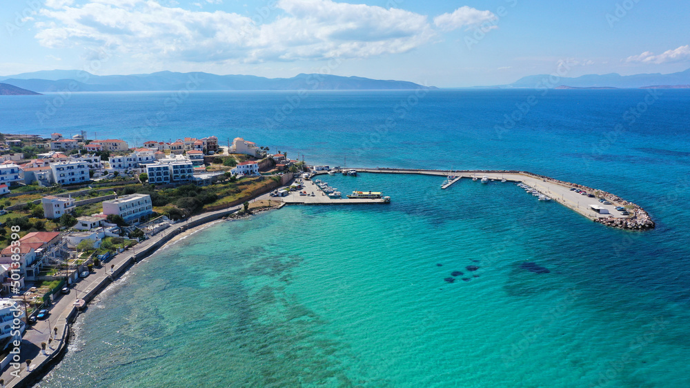 Aerial drone photo of small picturesque village beach and port of Megalochori in island of Agistri, Saronic gulf, Greece