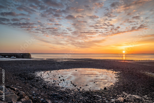 Landscape view of the Minehead Beach at sunset photo