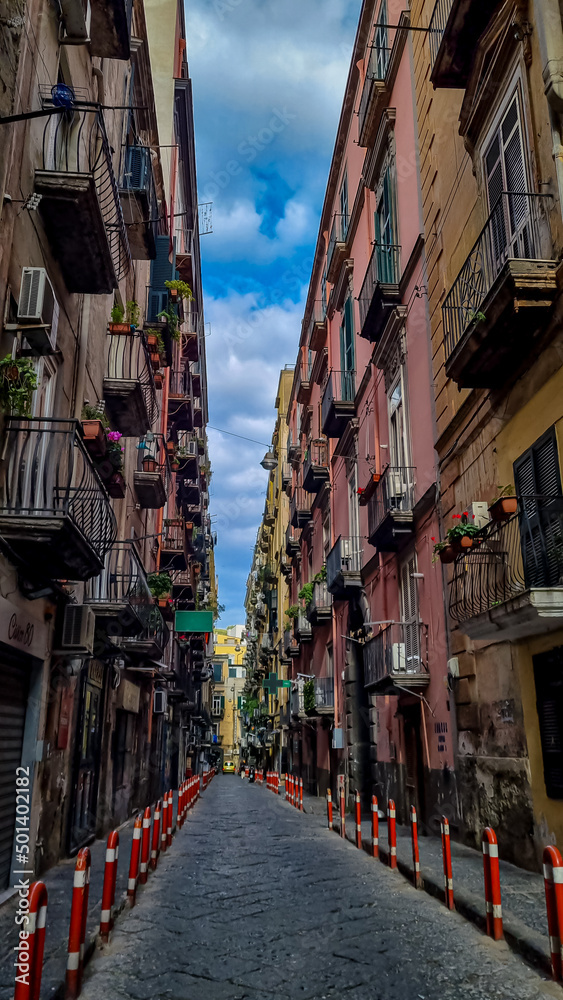 Walking in the narrow streets of Naples, Campania, Italy, Europe. Narrow alleyway in the old town of Naples. Area belongs to a UNESCO World Heritage site as part of the historic city center of Naples