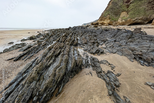 Rocks on the beach at Saunton Sands, Devon photo