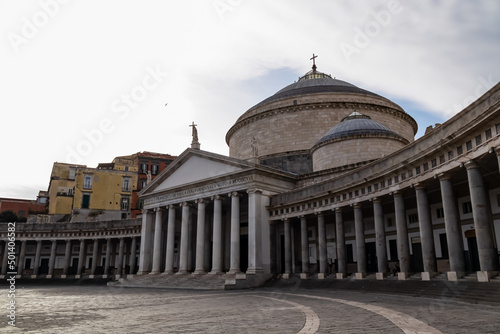 View on the Francesco Di Paola Church and the Piazza Del Plebiscito in the city center of Naples, Campania, Italy, Europe. The architecture is a doric semicircular auditorium. Main square in Napoli