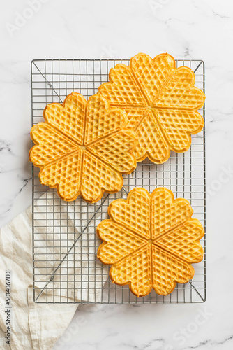 Scandinavian heart-shaped waffles with jam and fruits. Norwegian waffles