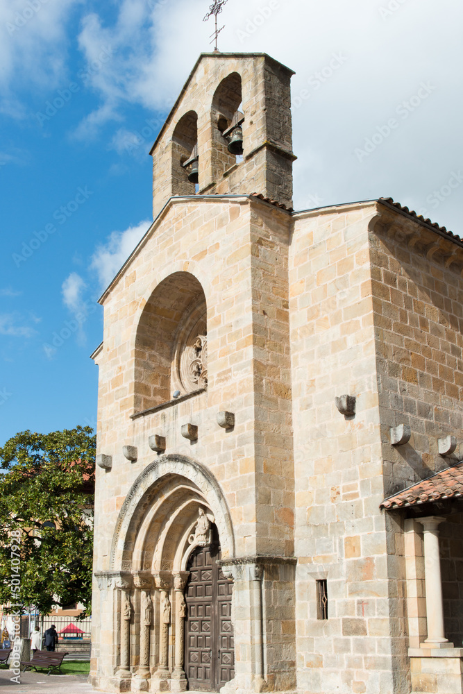 Vertical shot of Santa Maria de la Oliva, beautiful romanic church at Villaviciosa, Spain.