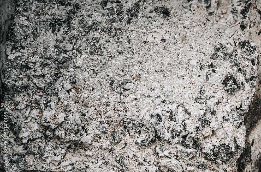 Background, texture of gray burnt ash after burning firewood. Background, texture of gray burnt ash after burning firewood.