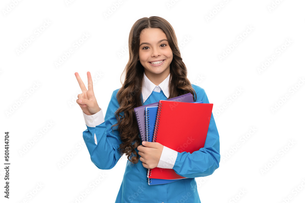 happy kid portrait with school workbook isolated on white show peace gesture, high school. happy kid portrait with school workbook isolated on white show peace gesture, high school.
