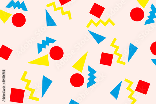 Creative geometric shapes made of vibrant colored paper on white bright background. Abstract 80s or 90s seamless design. Retrowave pattern concept.