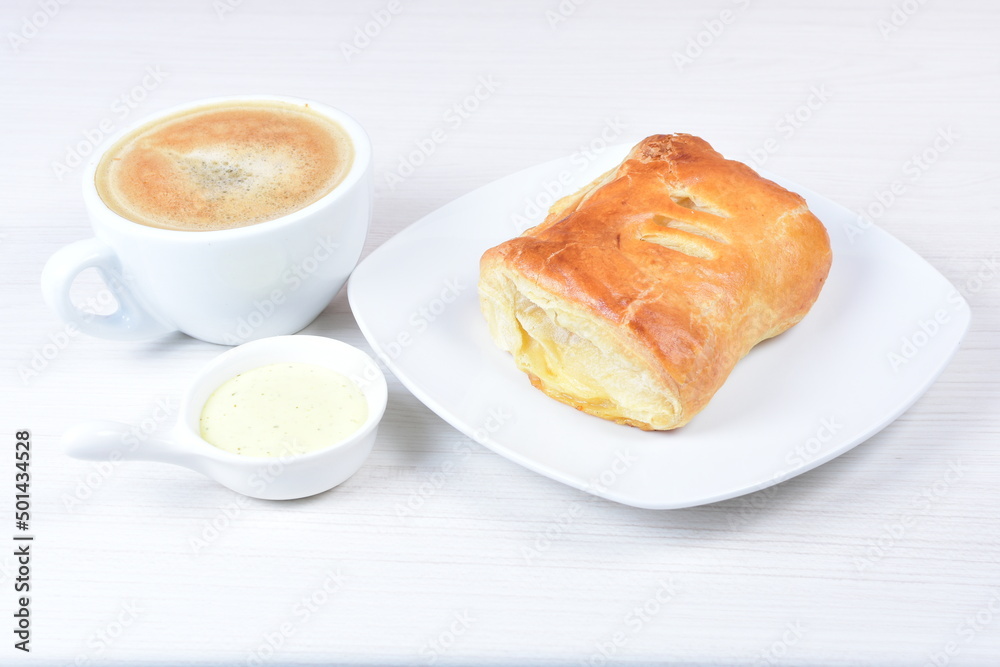 puff pastry multi-cheese cake on wooden background puff pastry multi-cheese cake on wooden background