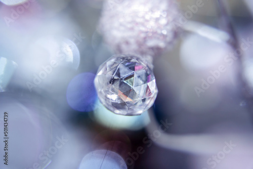 Crystal ball Christmas bauble luxury decoration blue bokeh background